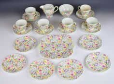 Shelley tea ware decorated in the Countryside pattern no 13690, comprising six trios, cake plate,