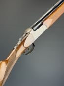 Lincoln 20 bore over and under ejector shotgun with engraved action, underside and thumb lever,