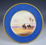H Allen for Royal Doulton cabinet plate with camels at an oasis decoration and a Chinese hardwood
