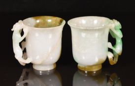 Pair of Chinese jade / jadeite or similar cups with figural chilong handles and relief moulded
