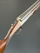 AYA Yeoman 12 bore side by side shotgun with chequered semi-pistol grip and beaver tail forend,
