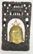 Chinese carved wood and brass temple bell, H38cm
