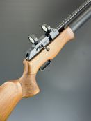 Theoben Rapid 7 .22 PCP FAC air rifle with textured semi-pistol grip, raised cheek piece and scope