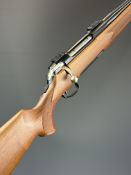 Titan 3 .222 Remington bolt-action rifle with chequered semi-pistol grip and forend, sling and scope