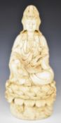 19th/20thC Chinese porcelain blanc de chine figure of Guanyin holding a sceptre, on lotus leaf base,