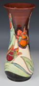Moorcroft pedestal vase decorated in the Red Tulip pattern, with box, H31cm