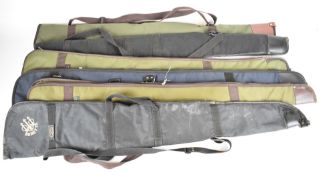 Six fleece lined shotgun or rifle slips including two Beretta, Bisley and KASU.