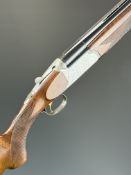 Browning Medallist Sporter 12 bore over and under ejector shotgun with named and ornately engraved