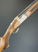 Beretta 691 12 bore over and under ejector shotgun with named and engraved action and underside,