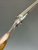 Belgian .410 side by side hammer action shotgun with engraved scenes of dogs to the locks,