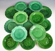 Fifteen mainly 19thC English Majolica plates with leaf / leaf and berry decoration comprising