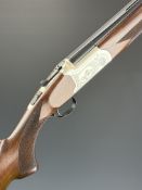 Yildiz 20 bore over and under shotgun with engraved scenes of birds to the action and named