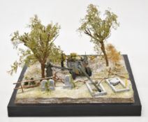 1/35 scale WW2 model diorama of a Soviet anti-tank gun / artillery with crew set up in a wooded