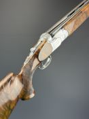 Beretta ASE 90 Trap 12 bore over and under ejector shotgun with gold inlaid naming, chequered semi-
