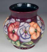 Moorcroft pedestal vase decorated in the Pansy pattern, with box, H14.5cm
