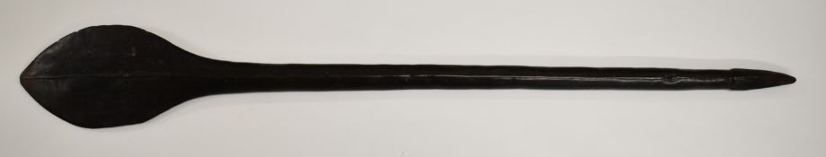 19thC Solomon Islands carved tribal paddle club with central raised spine, tapering handle and