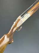 Beretta Ultralight Deluxe 12 bore over and under ejector shotgun with gold birds engraved to the