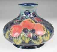 Moorcroft squat pedestal vase decorated in the Finches pattern, H11cm