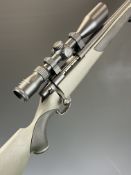 Weatherby Vanguard .223 bolt-action rifle with composite stock, textured semi-pistol grip and