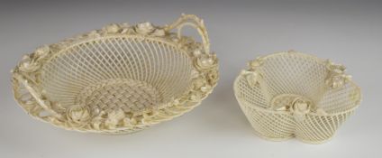 Two Belleek porcelain baskets/dishes with applied flower decoration, largest diameter 23cm x H9cm