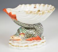 19th/20thC Berlin porcelain salt or bonbon dish with figural supports, shell finial and exotic