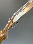 Zabala 12 bore over and under shotgun with named underside, engraved action and thumb lever,