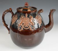 Large bargeware teapot with relief moulded royal coat of arms decoration, H28cm