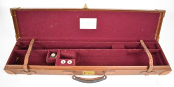 William Evans leather bound shotgun carry case with fitted interior and  'William Evans Ltd Gun &