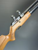 Theoben Rapid .22 PCP air rifle with chequered semi-pistol grip, raised cheek piece and scope