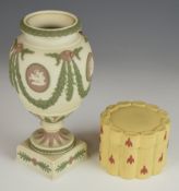 Wedgwood tricolour pedestal urn with classical cartouches, swags and ram's mask decoration, and a