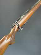 CZ 453 Premium .17 HMR bolt-action rifle with engraved action, ornately chequered semi-pistol grip