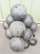 Ten cast iron fishing weights or similar with eyelets to attach ropes, each approximately 30cm in
