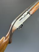 Browning 12 bore 2-shot semi-automatic shotgun with engraved action, chequered semi-pistol grip