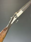 L Keegan of Dublin 20 bore hammer action shotgun with named and engraved lock, chequered grip and