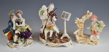 Dresden / Kunst porcelain figure of a violinist, Volkstedt figural spill vase and a figure of