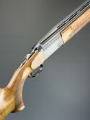 Blaser F3 12 bore over under ejector shotgun with named action and underside, chequered semi-