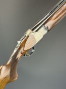 Miroku 12 bore over and under ejector shotgun with engraved locks, underside, trigger guard and