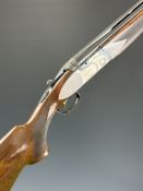 Beretta 682 Gold Sporting 12 bore over and under ejector shotgun with gold inlaid naming,