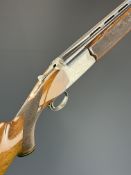 Nikko Model 2500 12 bore over and under ejector shotgun with engraved action, trigger guard,