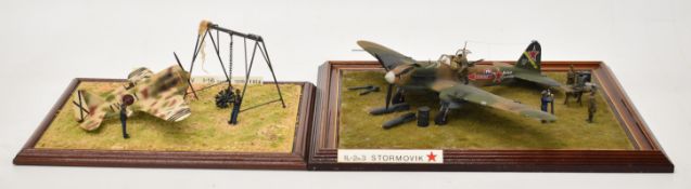 Two WW2 scale model dioramas comprising a 1/43 scale Soviet Ilyushin Il-2 Shturmovik attack plane on