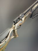 BSA R-12 CLX Pro .22 PCP air rifle with laminated show wood stock, chequered thumb-hole grip and