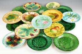 Seventeen 19th/20thC English and continental Majolica plates / dishes with flora and fauna