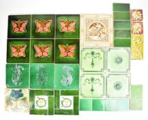 Collection of approximately twenty two Victorian / Art Nouveau tiles, largest 15.5cm x16.25cm