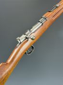 Carl Gustaf Mauser 6.5x55 Swedish bolt-action rifle with adjustable sights, sling mounts, brass