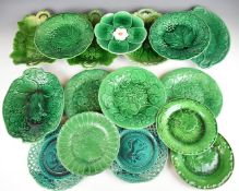 Sixteen mainly 19thC English and continental plates / dishes with leaf / leaf and berry decoration