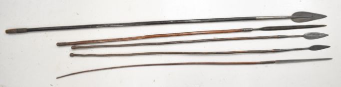 Five mainly 19thC tribal spears, all with wooden shafts and metal tips, some weighted, largest 193cm