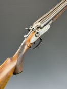 Case & Barnes of East Grinstead 12 bore side by side hammer action shotgun with engraved scenes of