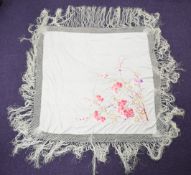 19th/20thC Chinese embroidered piano shawl with prunus blossom decoration on a mint green ground,