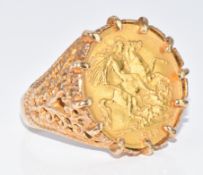 A 9ct gold ring set with a 1913 gold half sovereign, 8.9g, size P