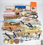 A collection of jewellery including silver St Christopher key ring in the form of a steering